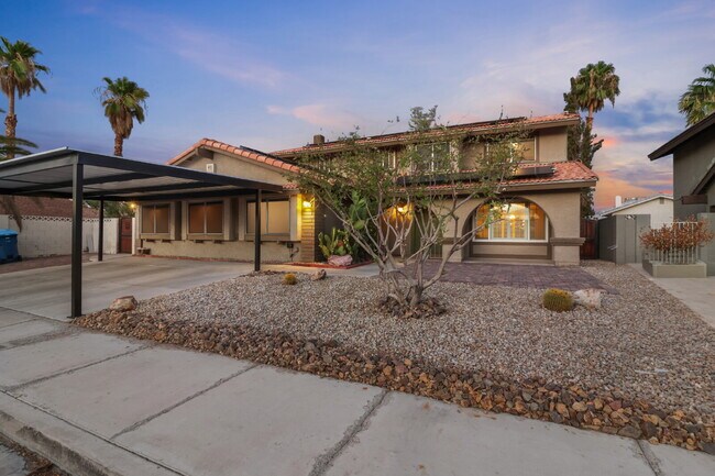 Building Photo - Welcome to your entertainers dream home with solar and pool service included!