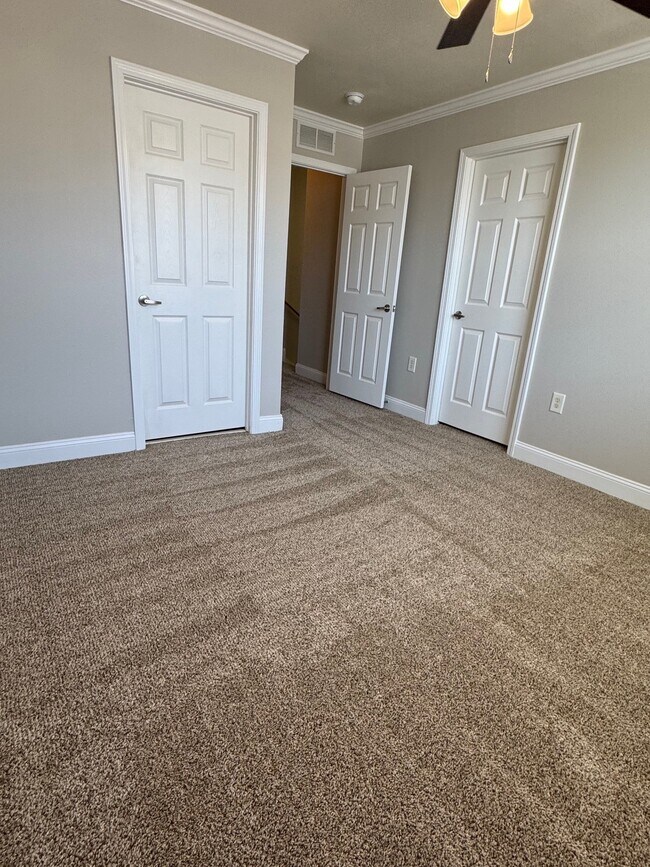 Guest Bedroom with walk-in closet and ensuite bathroom - 581 Wingspan Way