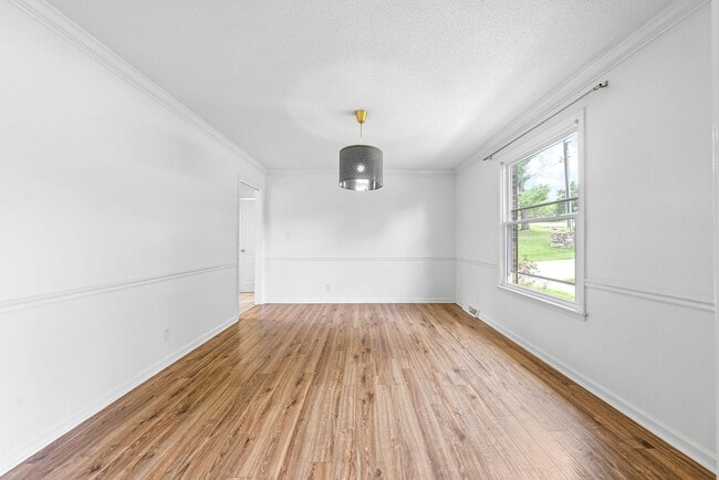 Building Photo - Pet Friendly Three Bedroom with Basement!