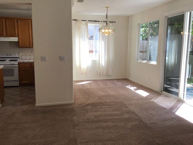 Building Photo - Three bedroom in gated community.