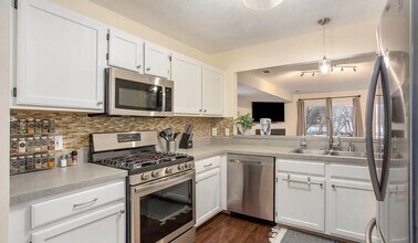 Building Photo - Charming 3-Bedroom End Unit Condo – Prime ...