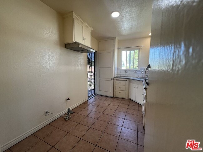 Building Photo - 5114 1/2 4th Ave