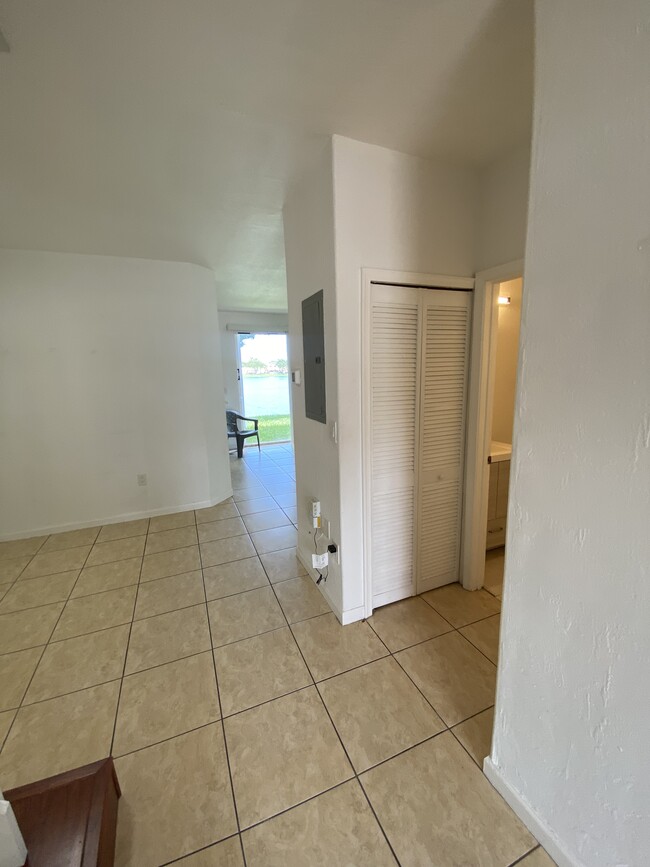 Ground floor hallway: bathroom and A/c closet at right - 2451 SE 14th Ave