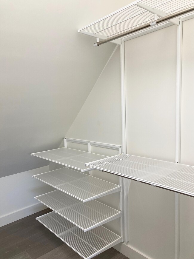 Walk-in closet Elfa shelving - 399 Lowell Rd