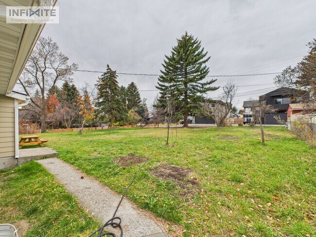 Building Photo - Spacious 4-Bedroom Apartment Just 4 Blocks...