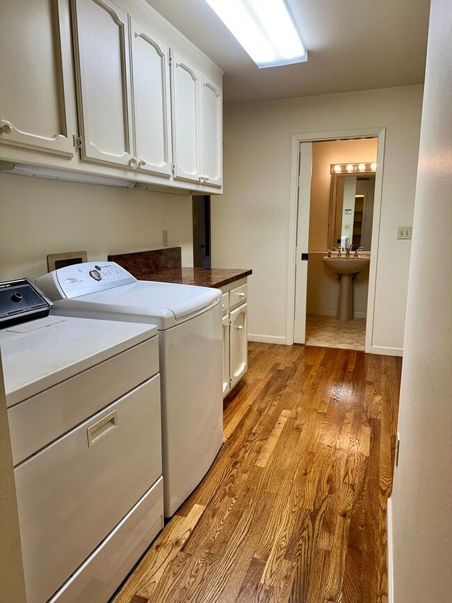 Building Photo - Available now, Executive 4 bdrm home with pool & hot tub!