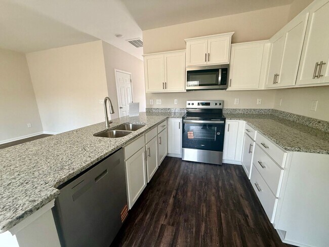 Building Photo - Two bedroom, 2.5 bath townhome in Ridge Creek, Whitsett-Save $1050!
