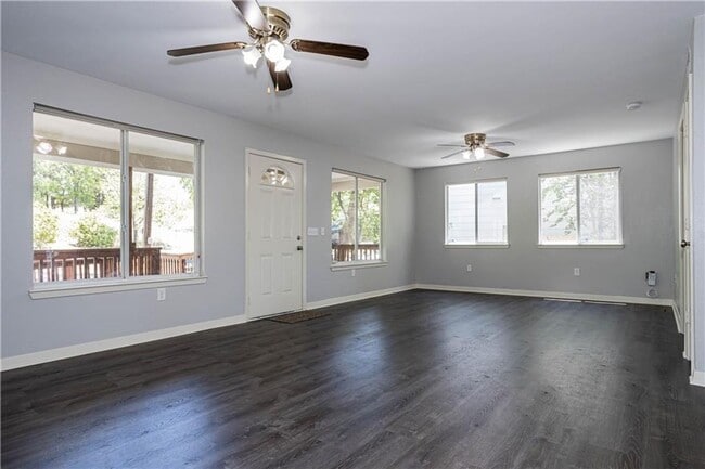 Building Photo - Stunning Renovation - New Hardwood flooring, tile in Kitchen. Granite countertops, breakfast bar