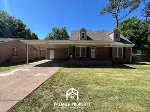 Building Photo - Spacious 4BR/2BA Home in 38118 | Hardwood Floors & Large Fenced Backyard