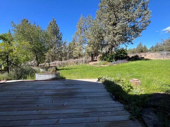 Building Photo - Custom Rustic 4-Bdr on beautiful 5 acres with Greenhouse in Sisters!
