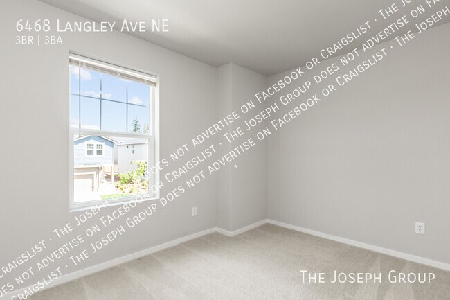 Building Photo - 6468 Langley Ave NE
