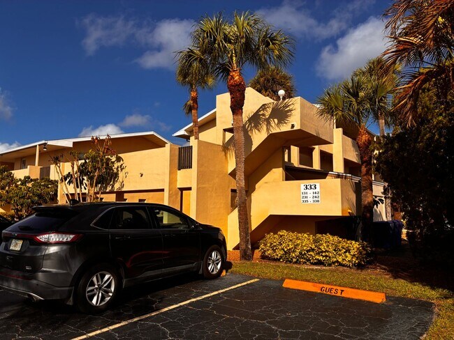 Building Photo - 55+ Charming first-floor condo nestled in the serene Fairways 3 Condominiums