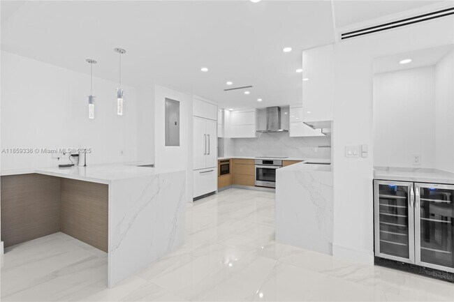 Building Photo - 9801 Collins Ave