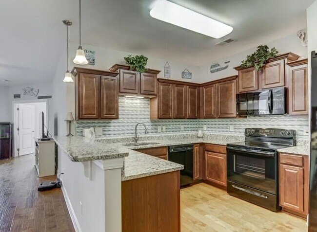 Building Photo - Dive Into Your New Oasis!