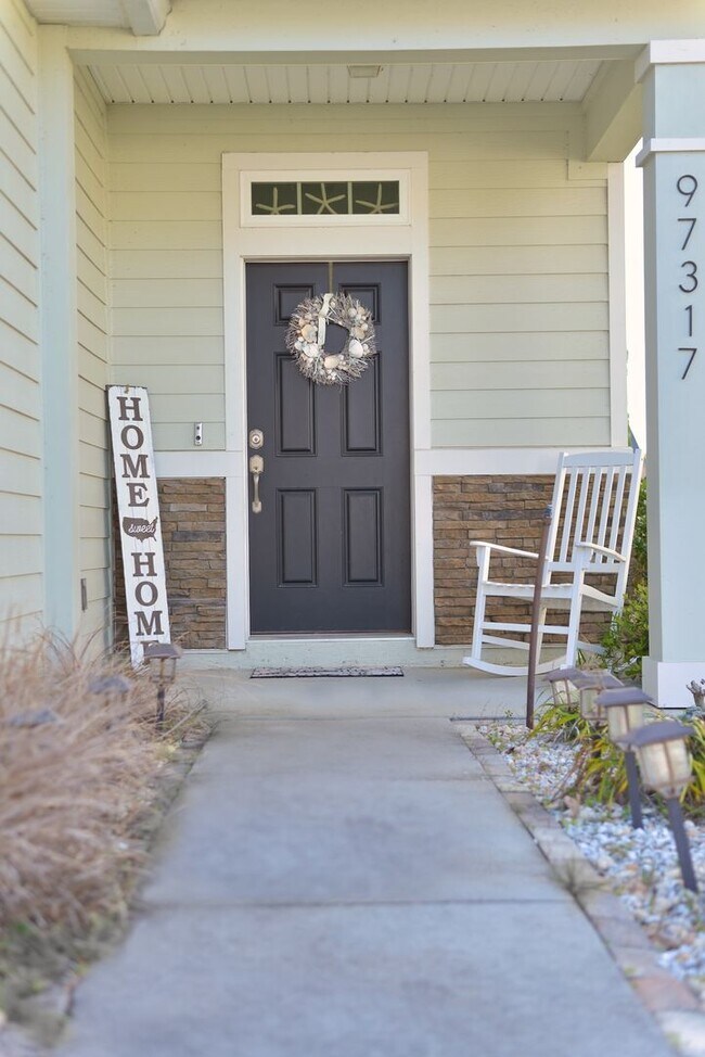 Building Photo - Beautiful Pond-Front Home Near Amelia Concourse