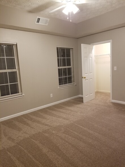 Large Master bedroom on backside of the home. - 48 Timber Ridge Dr