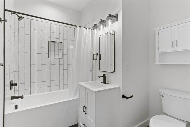 Building Photo - Brand new 2 bed/2 bath, central a/c, dishwasher, washer & dryer, deck & patio! April rent free!