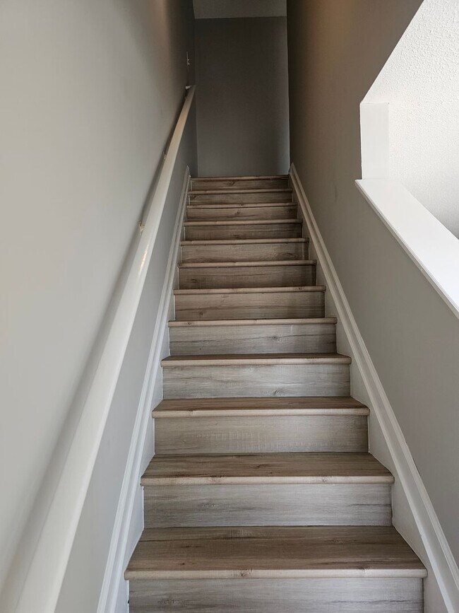 Building Photo - Move In special! 1/2 off the first Months rent!! 2 Bedrooms, 2.5 Baths Townhouse located in a Qui...