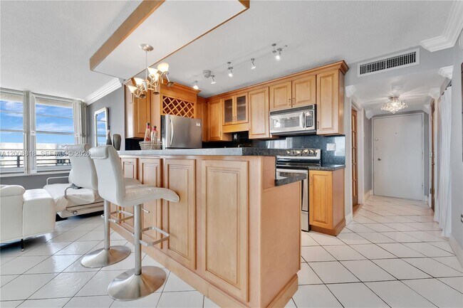 Building Photo - 5555 Collins Ave