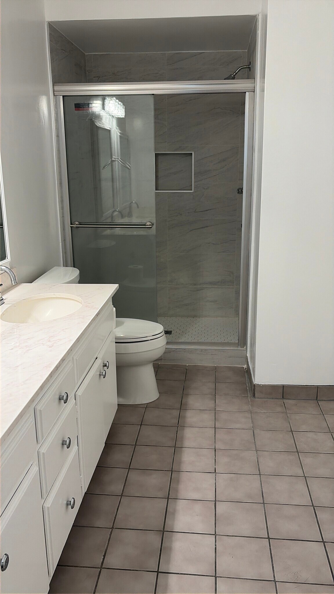 Primary bathroom with two sinks and room for a dresser - 2346 Kerwood Ave