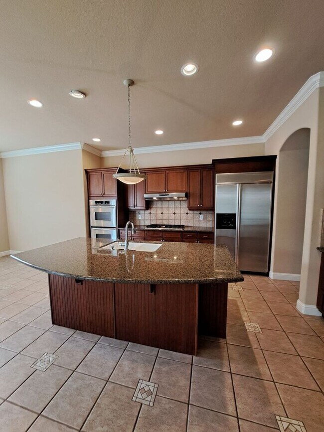 Building Photo - PRICE REDUCED TO $3795 – Custom Clovis Residence in Gated Community | Spacious Layout & 3-Car Gar...