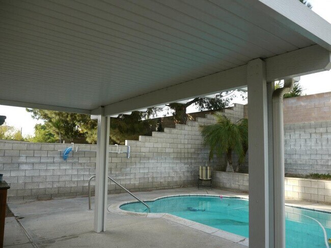 Building Photo - Charming 2-Bed, 2-Bath Pool Home with Fireplace & 2-Car Garage in Quiet Colton Neighborhood