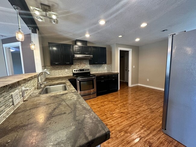 Building Photo - new carpet installed, 600sqft bonus room with large RV/Boat parking space