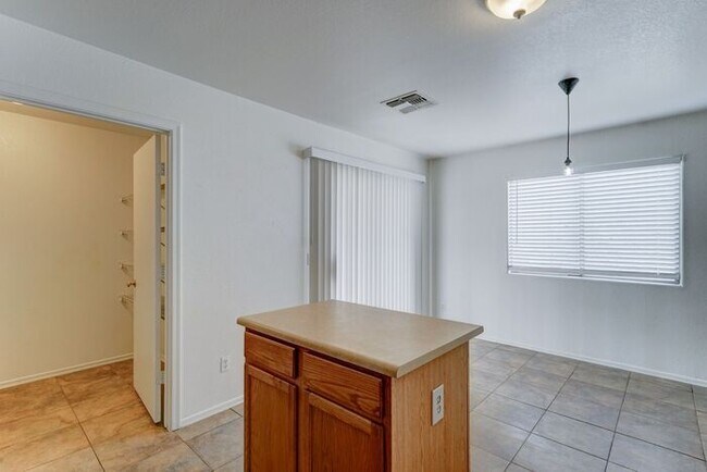 Building Photo - COMING SOON! Spacious 3 Bed 2 Bath home in the Estrella Neighborhood