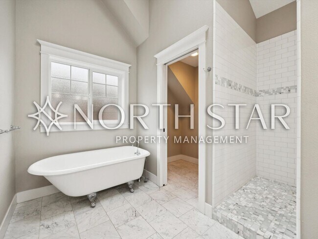 Building Photo - Exceptional Custom Home with Fully Appointed ADU in Prime John’s Landing Location