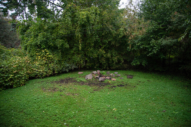 Backyard firepit. - 1911 Talmage Ave SE