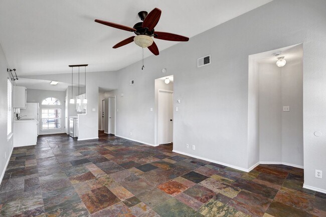 Building Photo - Carpet-Free Home with High Ceilings & Outdoor Retreat