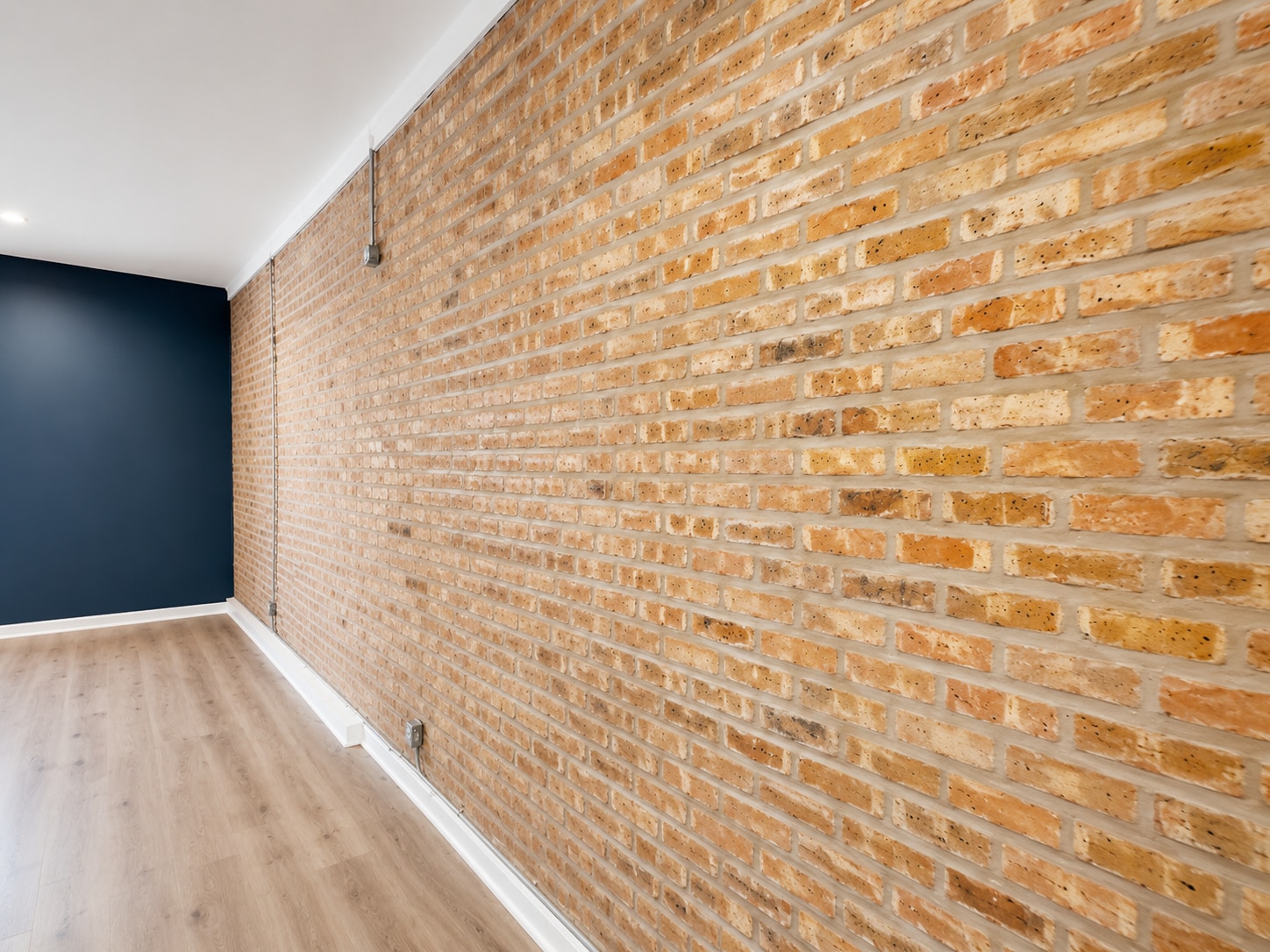 Exposed brick wall - 2405 N Neva Ave