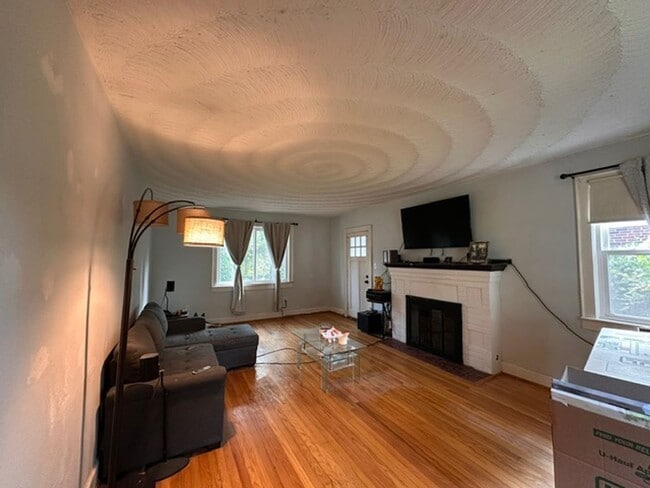 Building Photo - Charming Brick Cape Cope