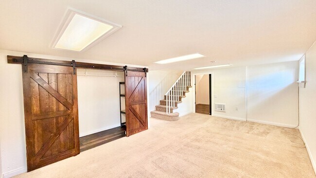 Building Photo - Beautiful Craftsman-style Home with fenced yard space, detached garage and additional parking in ...