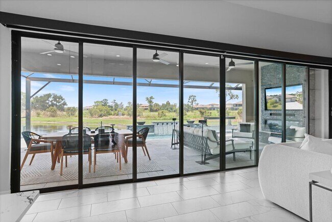 Building Photo - Luxury Home w/ Pool, Outdoor Kitchen, Car Lift, & Water View In Parrish!