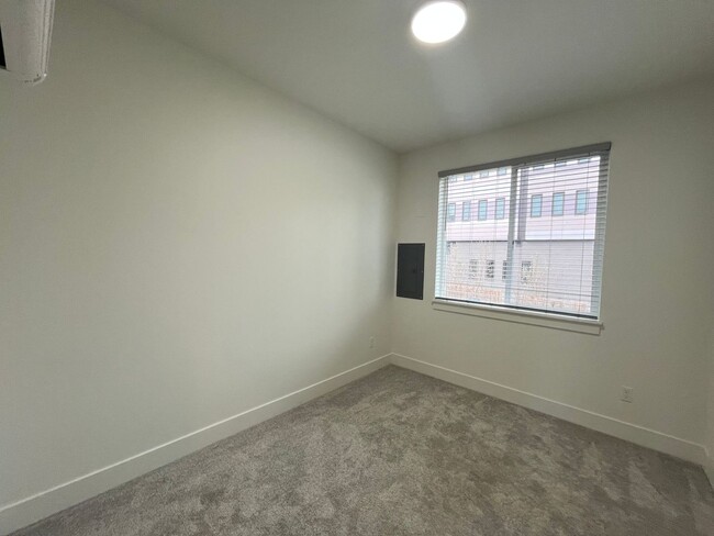 Building Photo - Modern 2-Bed, 1.5-Bath Condo with Custom K...