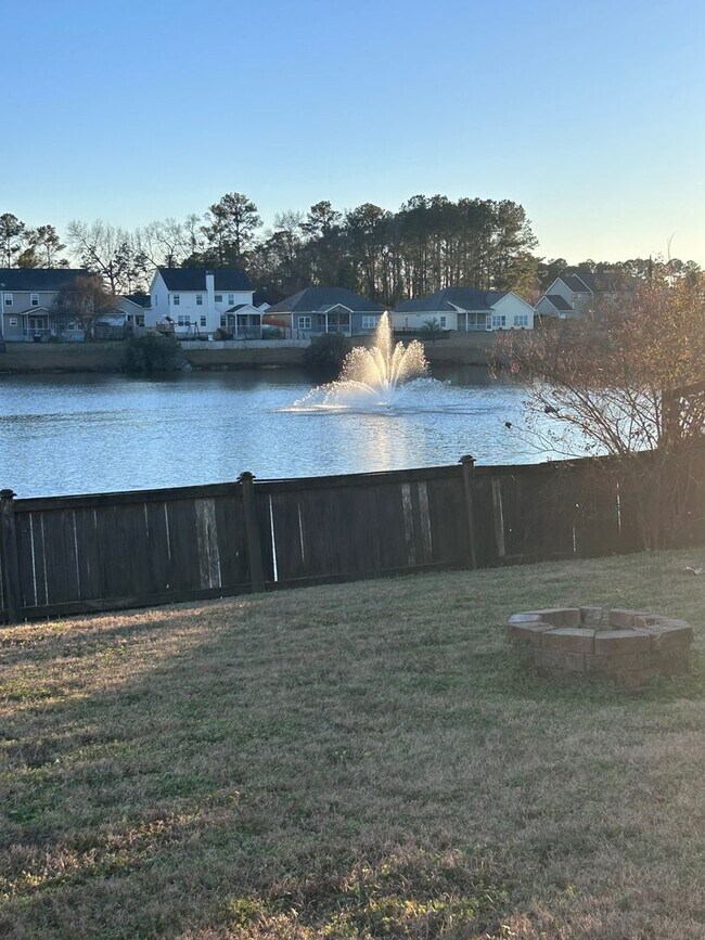 Building Photo - Stunning 4BR Home with amazing pond views!