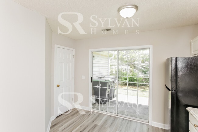 Building Photo - Welcome to this beautiful and sun-filled 3...