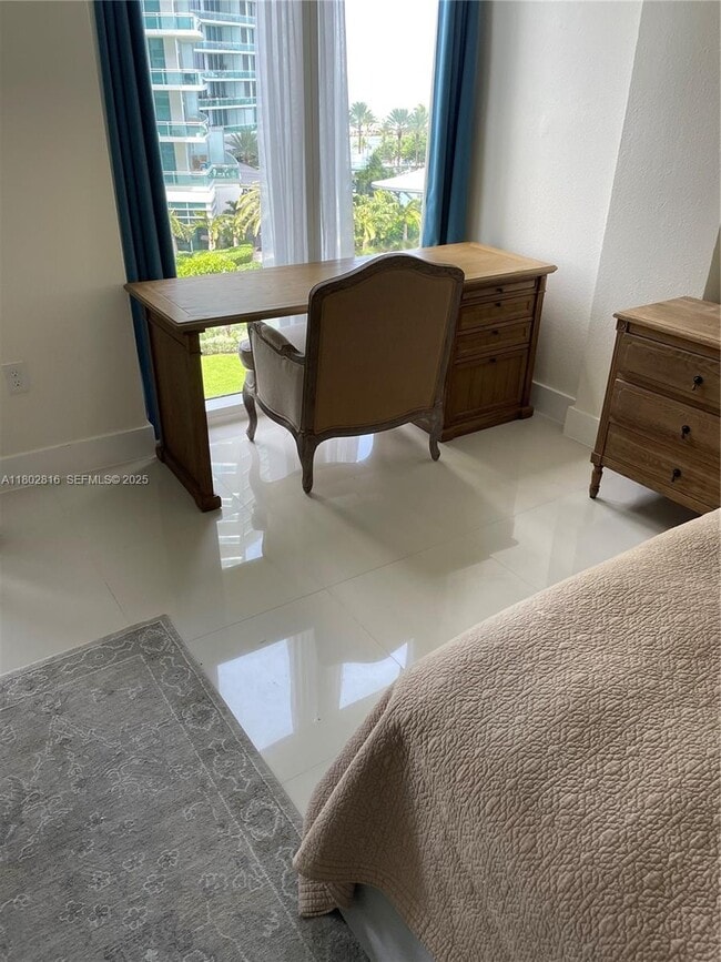 Building Photo - 10275 Collins Ave