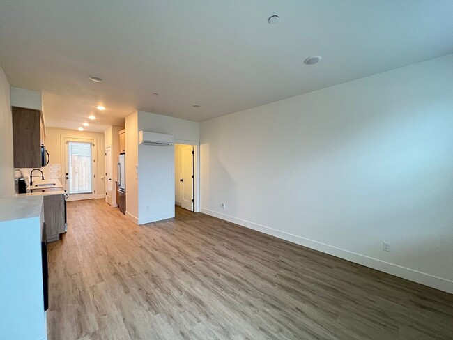 Building Photo - Modern 2-Bed, 1.5-Bath Condo with Custom K...