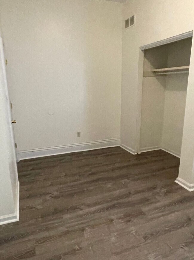 Building Photo - Updated three bedroom two bathroom home in...