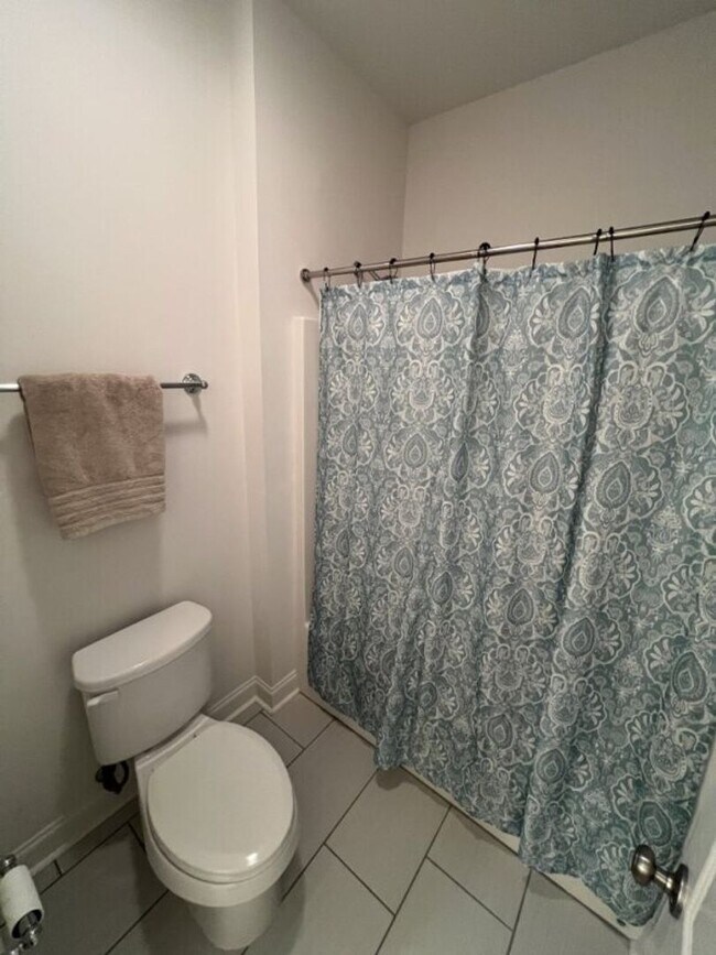 Building Photo - Luxury 4BR Home in Americana | 11 Ft Ceilings, Courtyard Living & Furnished Option at $3,950