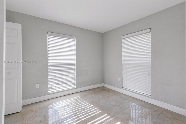 Building Photo - 241 S Royal Poinciana Blvd