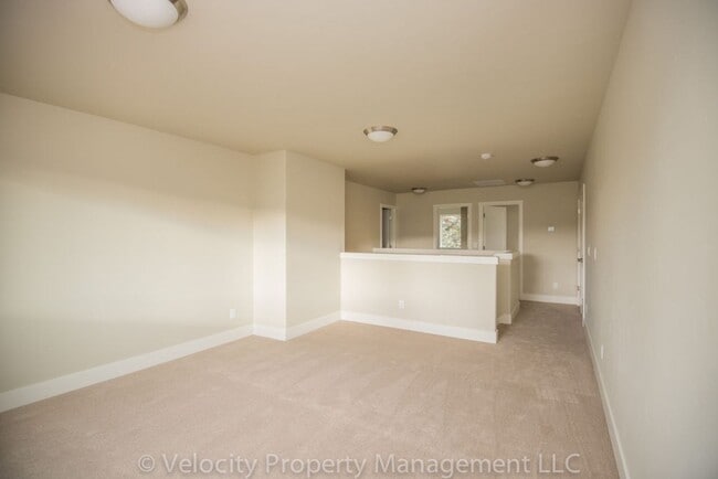 Building Photo - Townhome with Primary Bedroom on the Main ...