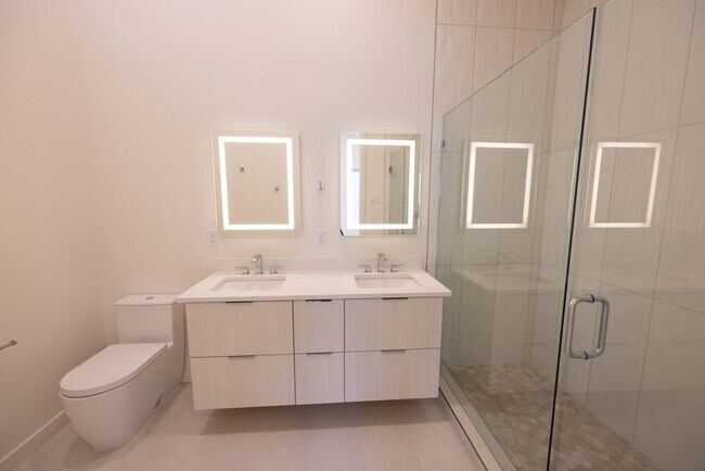 Building Photo - Riverside Townhomes - Waterfront Living in...