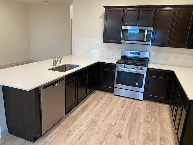 Building Photo - 14205 Mcarthur Dr