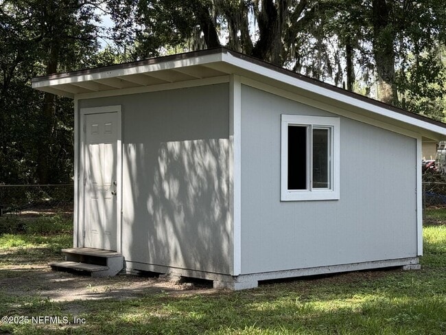 Building Photo - 6968 Miss Muffet Ln S