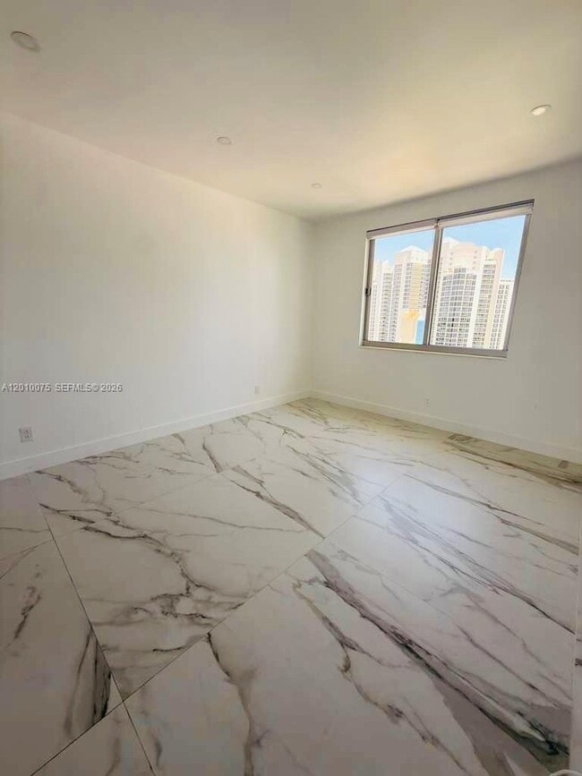 Building Photo - 19370 Collins Ave