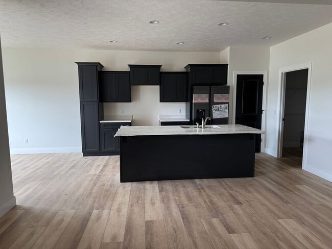 Building Photo - New Construction! West side location. 4br, 3bth, 2crg, Finished basement. All new stainless steel...