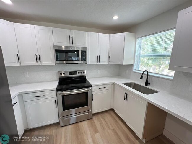 Building Photo - 10540 NW 28th Ave